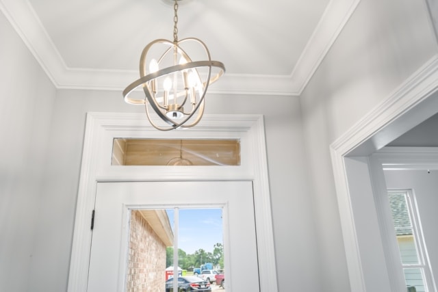 a hallway with a light fixture and a door.