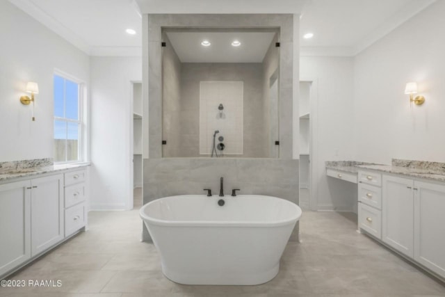 a white bathroom with a tub and two sinks.