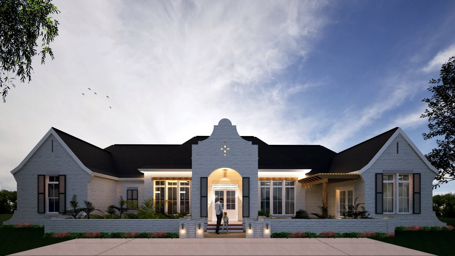 A single-story white brick house with a central arched entryway, large windows, and a dark roof. Two people stand at the entrance. The home is surrounded by landscaping and the sky is partly cloudy.