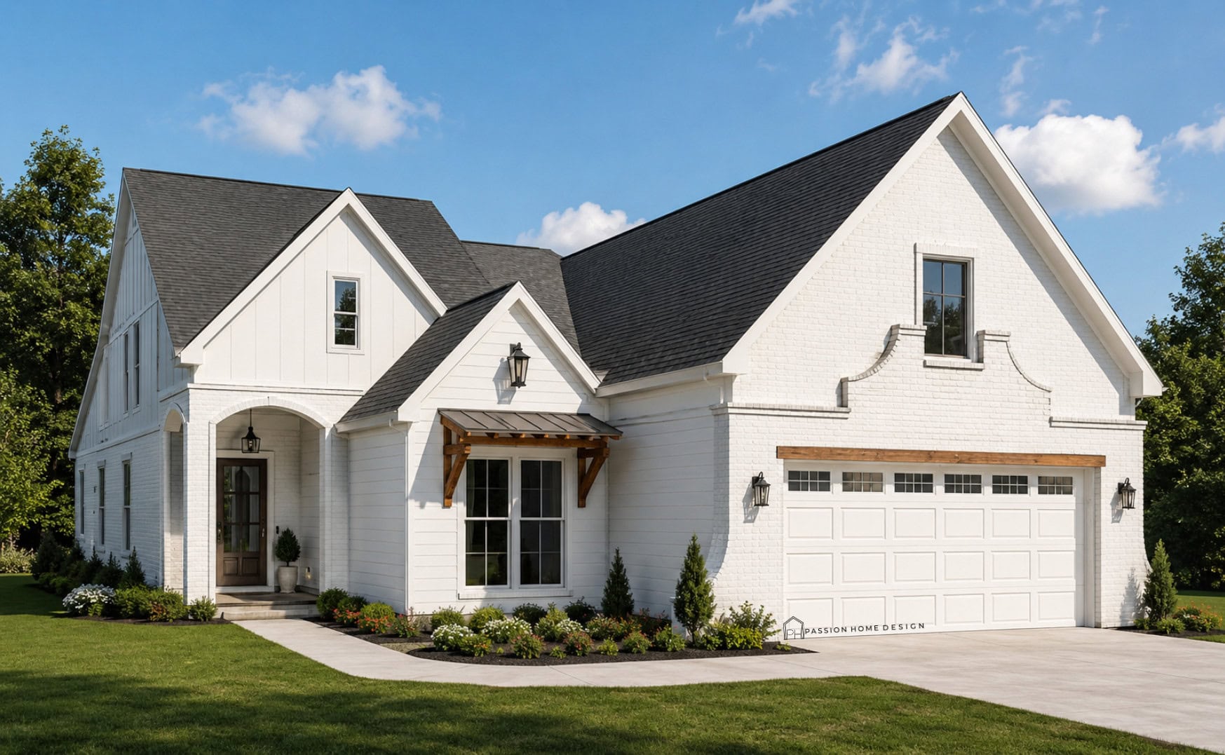 A modern white two-story house with black shingles, large windows, and a double garage. The front yard has green grass, shrubs, and a curved driveway leading to the entrance. Trees and blue sky are in the background.